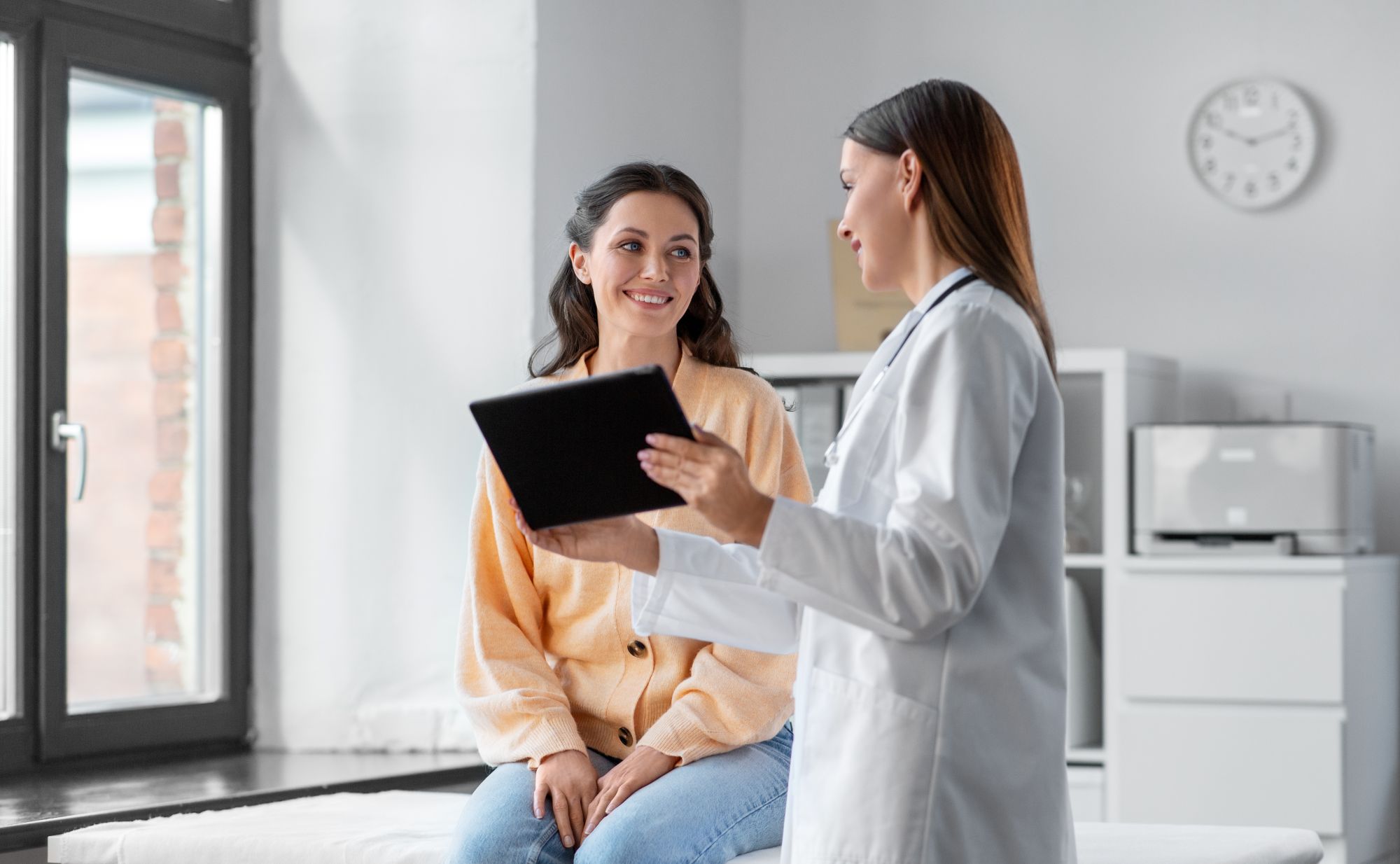 Doctor explaining Mini-IVF treatment to patient